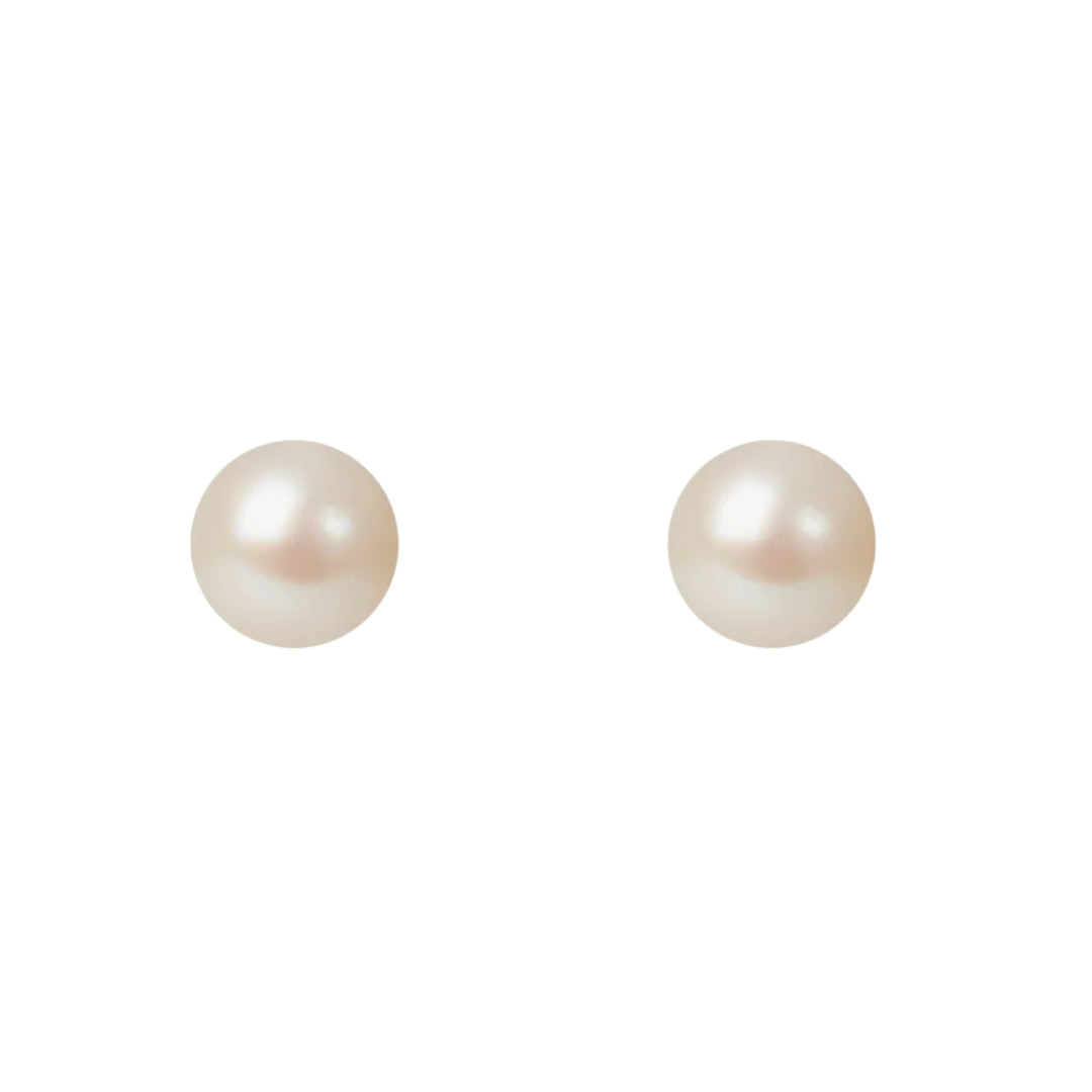 Pair of pearl earrings on a white background