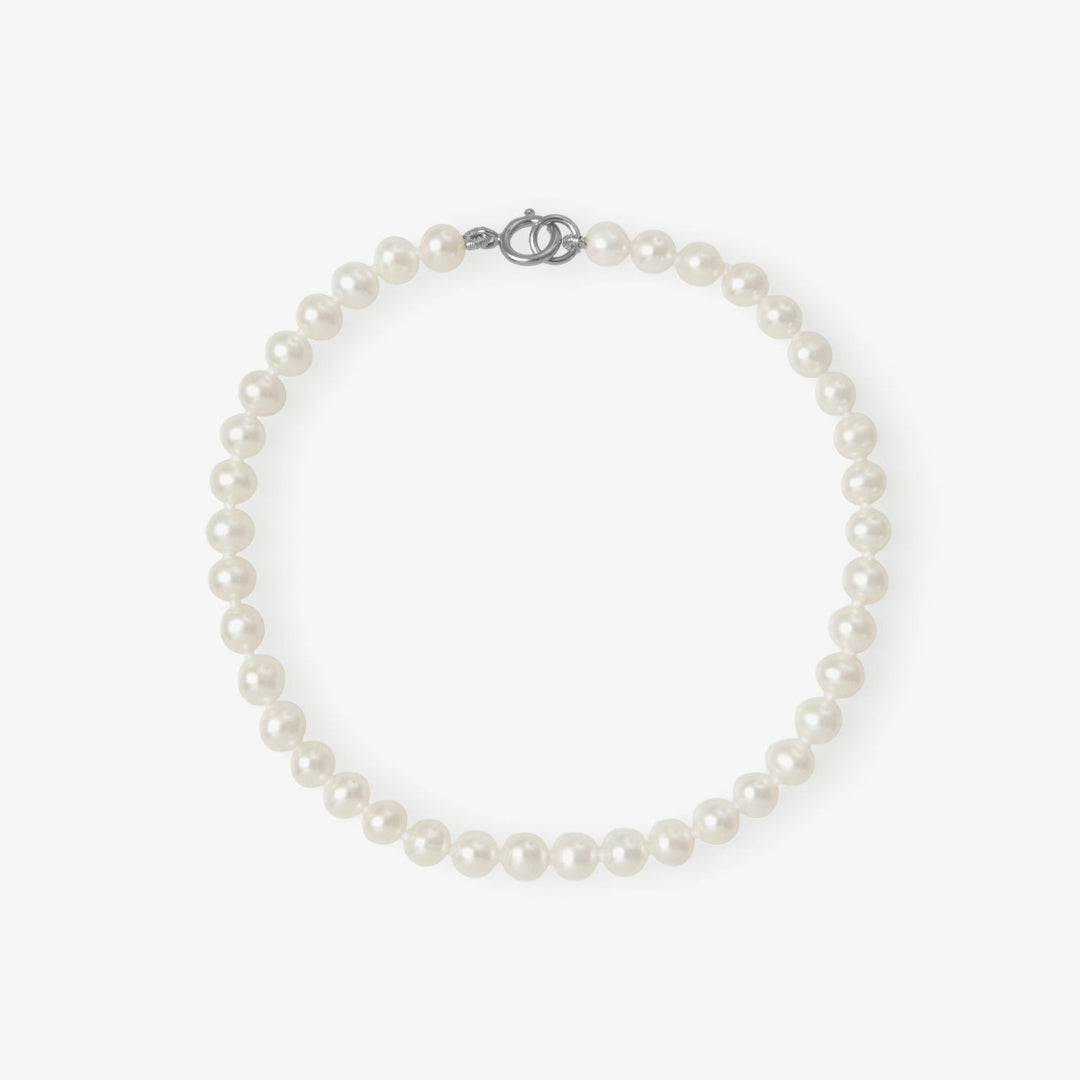Pearl necklace on a white background