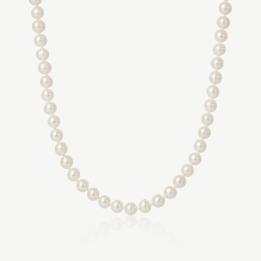 Pearl necklace on a white background