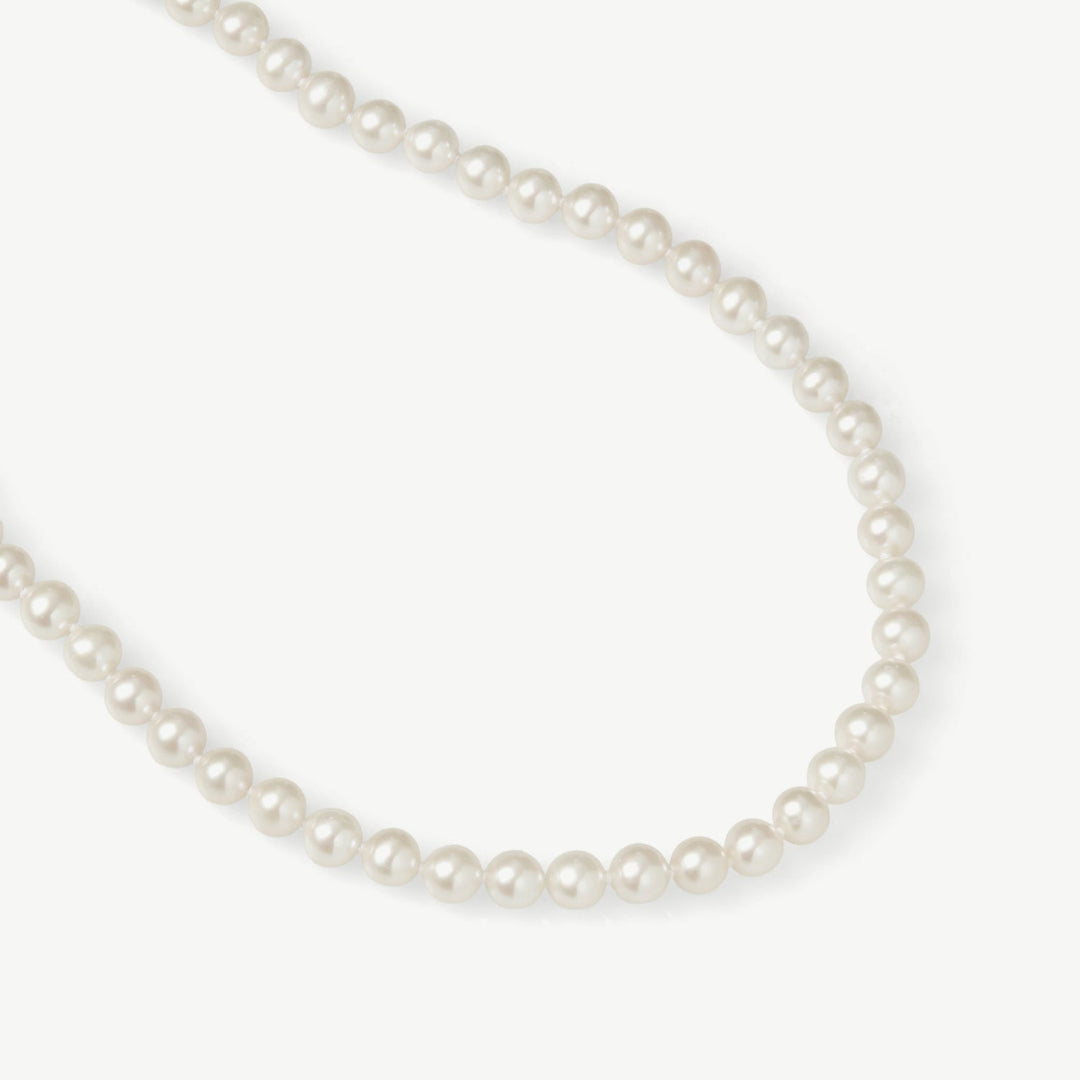 Pearl necklace on a white background