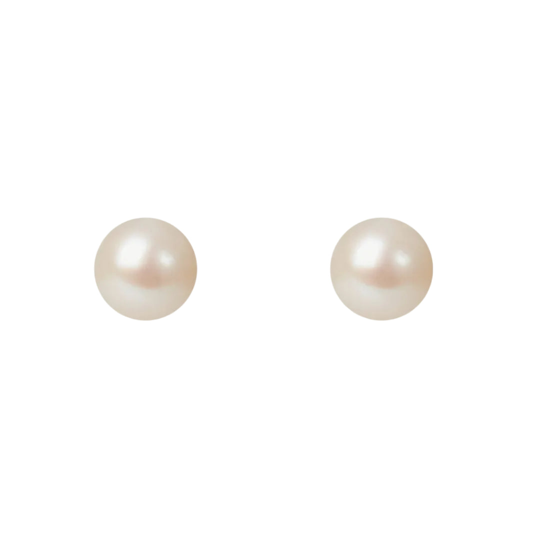 Pair of pearl earrings on a white background
