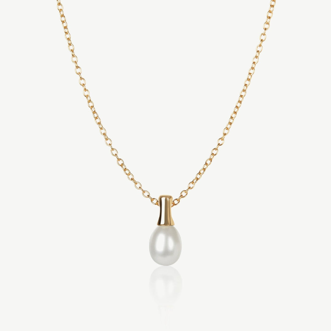 Gold necklace with a pearl pendant on a white background