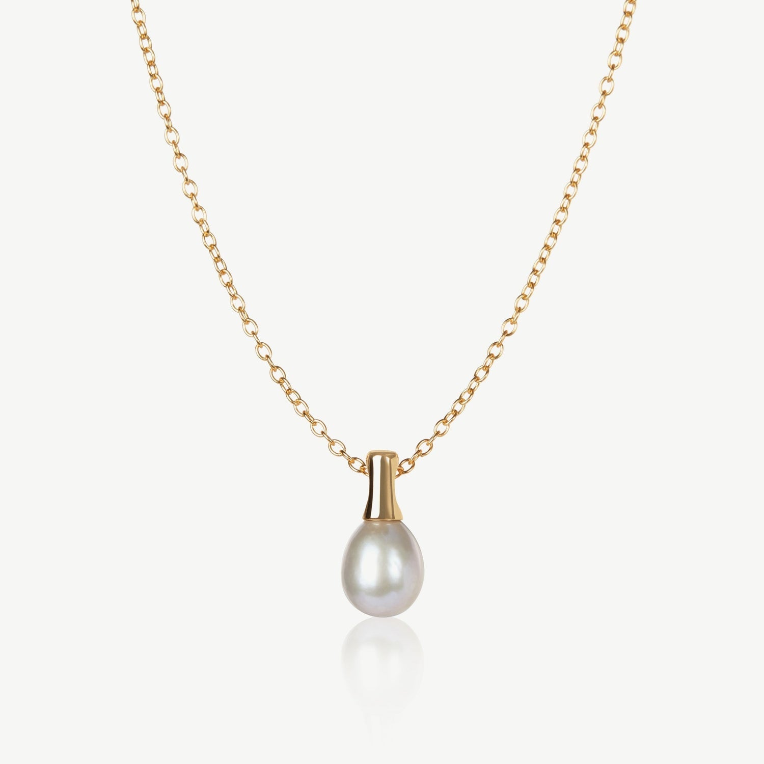 Gold necklace with a pearl pendant on a white background