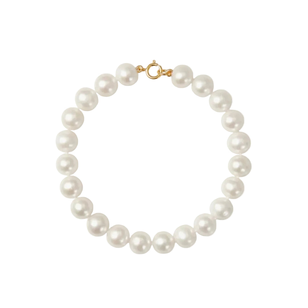 Pearl bracelet with a gold clasp on a white background