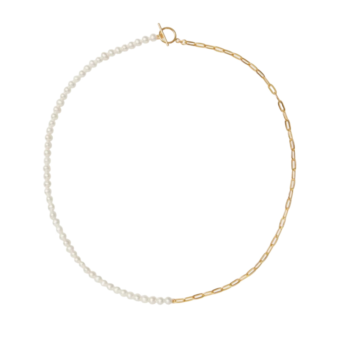 Gold chain necklace with pearl beads on a white background