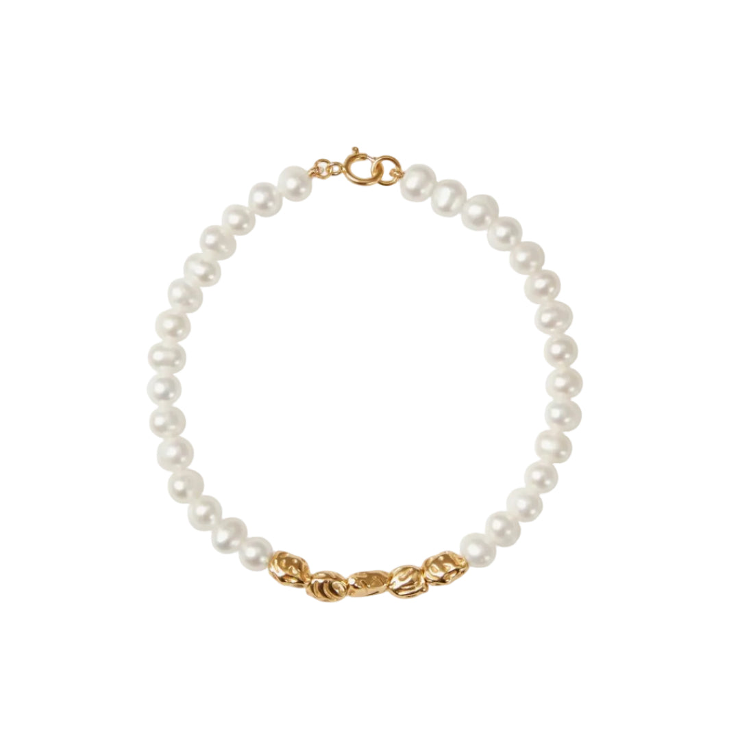 Pearl bracelet with gold clasp on a white background