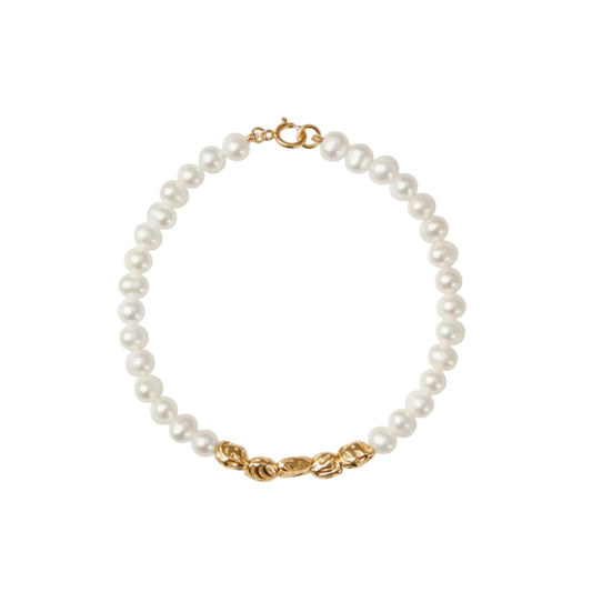Pearl bracelet with gold clasp on a white background