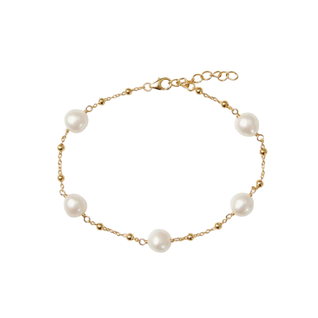 Pearl bracelet with gold chain on a white background