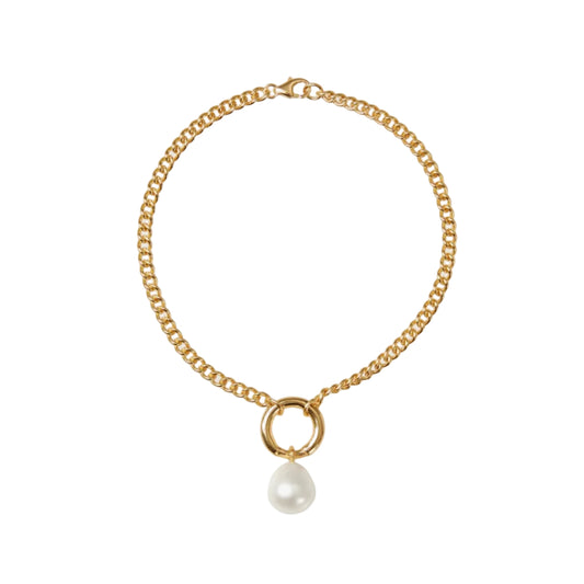 Gold chain bracelet with a pearl pendant on a white background