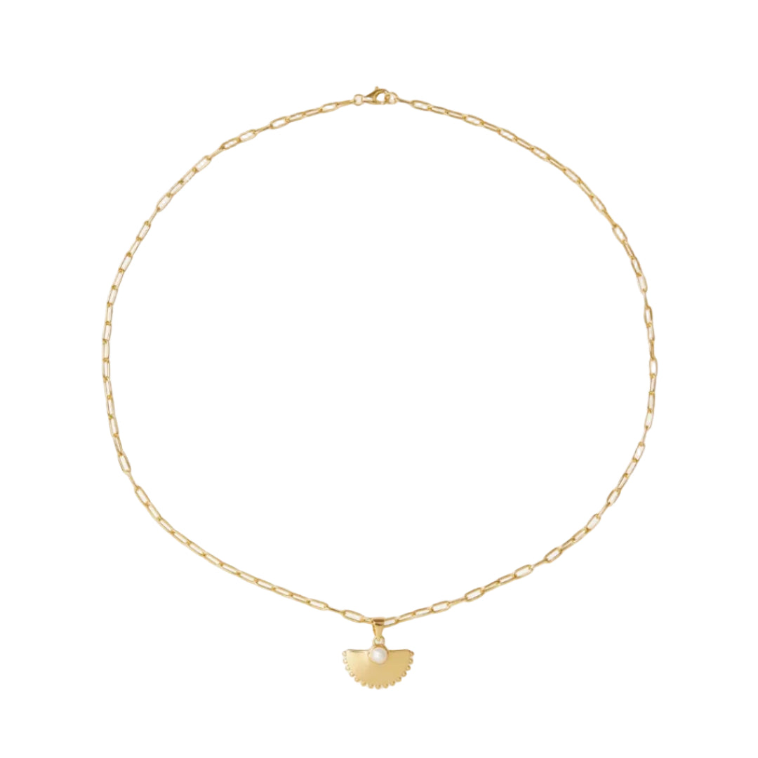 Gold necklace with a heart-shaped pendant on a white background