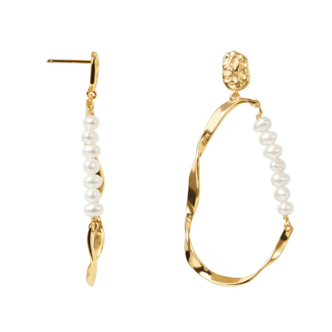 Gold hoop earrings with pearl accents on a white background